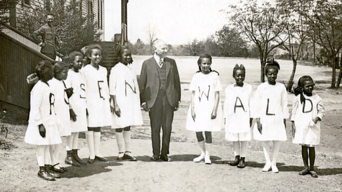 Julius Rosenwald stands with young students outside a Rosenwald school|Map by the Julius Rosenwald Fund from 1932 showing the locations of 5.