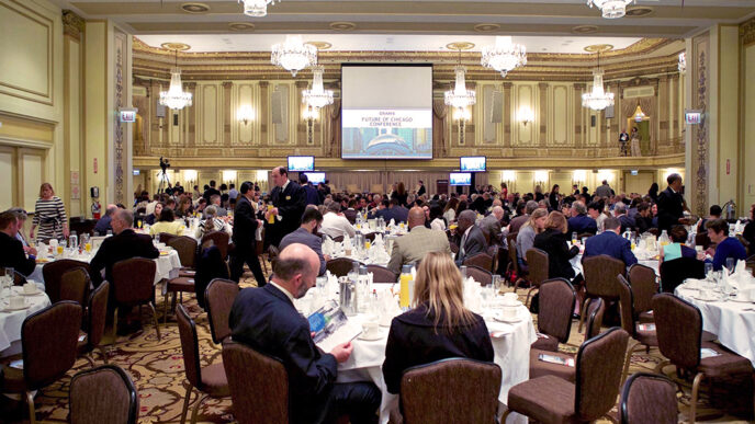 Guests at the Palmer House for the Future of Chicago Conference|Panelists on stage discussing education in Chicago|