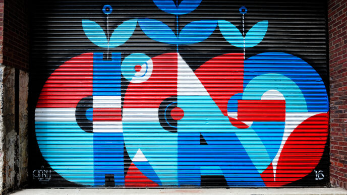 A mural reading Chicago painted on an industrial overhead door