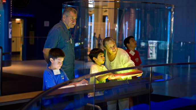 Family enjoying the Museum of Science and Industry