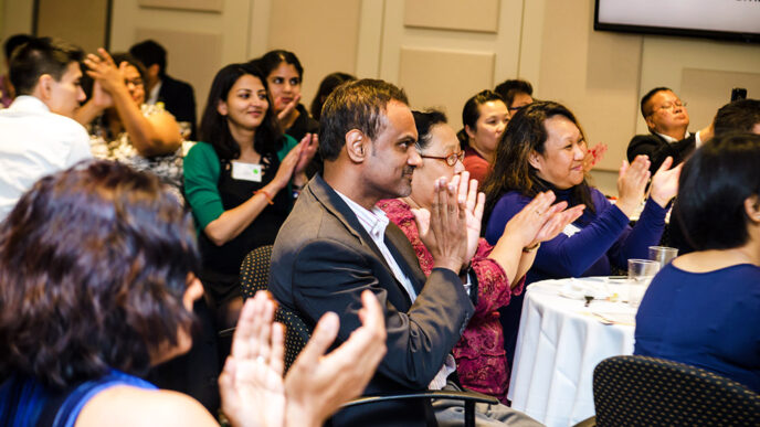 Guests applauding at the Asian Giving Circle reception|Guests in animated conversation|i2i’s Leakhena Yoeun talks with SAAPRI incoming executive director Reema Kapur