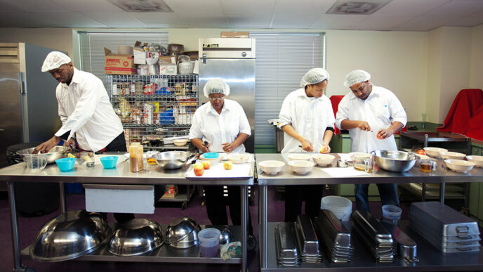 Participants in a culinary training program learn workforce skills.