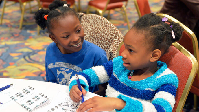 Two young Chicago students at an On the Table event.