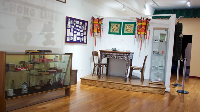 Traditional furniture on an exhibit at the Chinese American Museum of Chicago|Historic artifacts on display at the Chinese American Museum of Chicago.