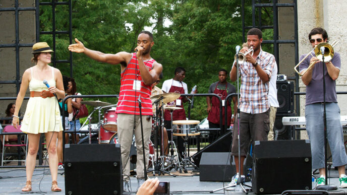 Performers on stage at the Westside Music Festival in Douglas Park|Data map of Chicago showing how accessible residents in various communities feel the arts are in their neighborhoods.