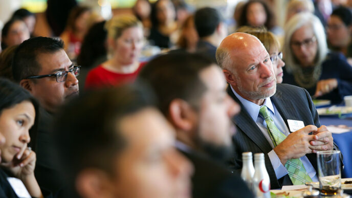 Terry Mazany and other guests at the Nuestro Futuro panel discussion.