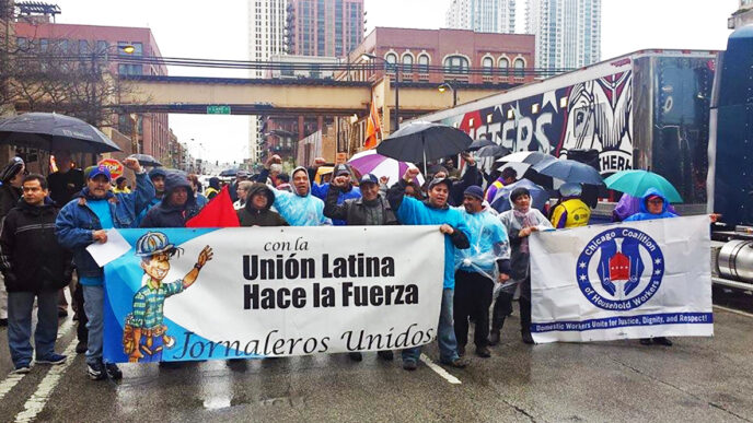 Workers and organizers with Latino Union at a May Day march downtown|Tom Long|Mechthild Hart|Aurelia Aguilar with her niece Mari.