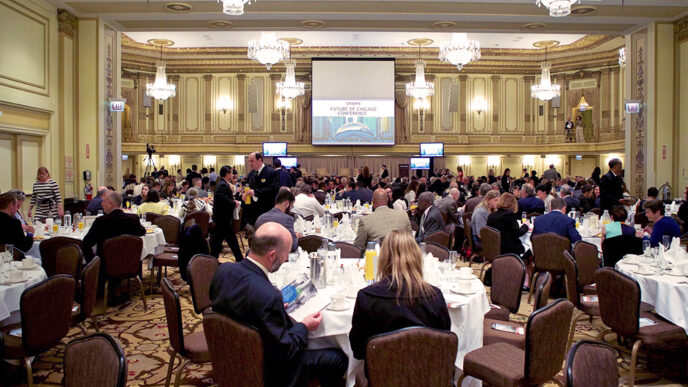 Guests at the Palmer House for the Future of Chicago Conference|Panelists on stage discussing education in Chicago|.