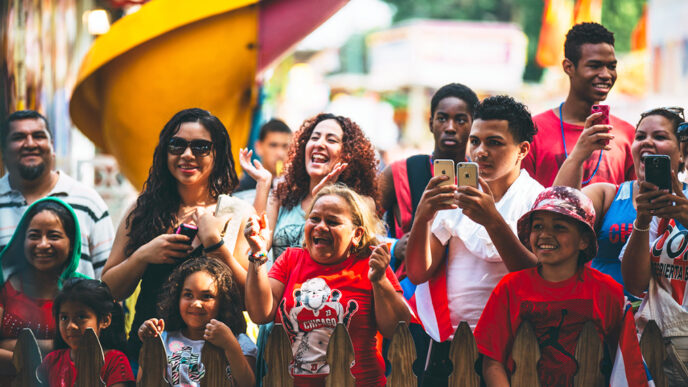 A crowd of people smiling.