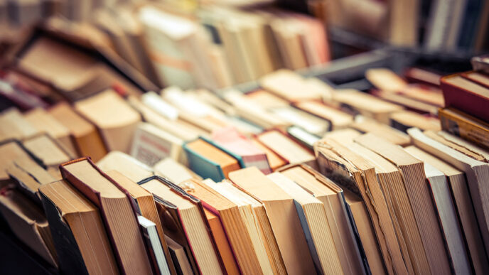 Close-up of books on a shelf.