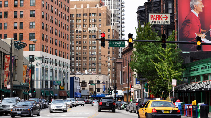 Street scene in Chicago's Gold Coast neighborhood|Dr. Raphael Bostic speaking at the How Place Matters summit.