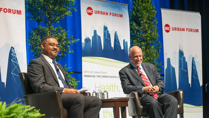 Joe Hoereth of IPCE and Terry Mazany of The Chicago Community Trust on stage at the UIC Urban Forum.