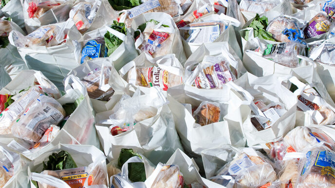 Bags of groceries at a food pantry.
