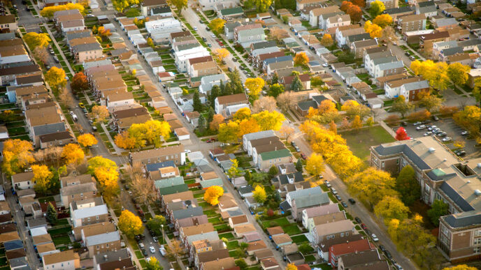 Aerial view of a residential neighborhood near Midway Airport with brightly colored autumn trees.