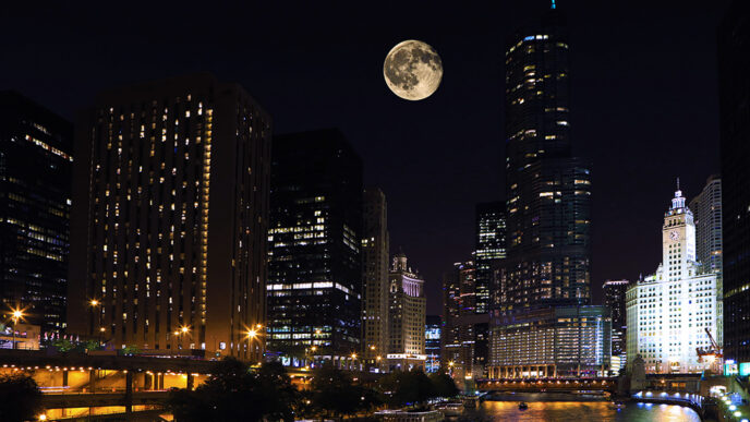 A full moon over the downtown Chicago skyline.