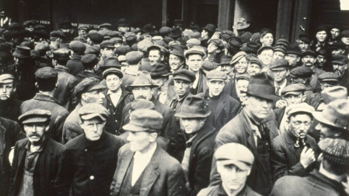 Black and white photo of unemployed men during the 1930s.